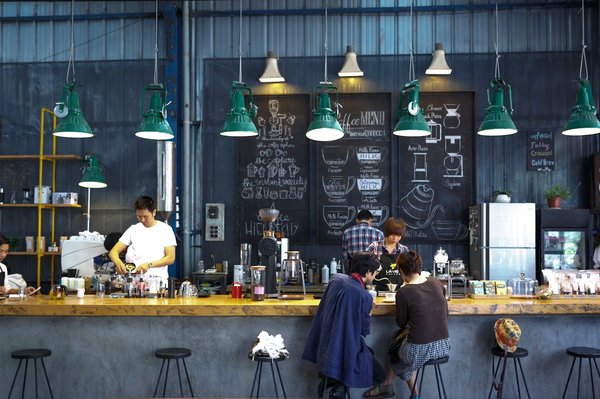 What innovations in coffee brewing can cafes adopt to attract more customers?